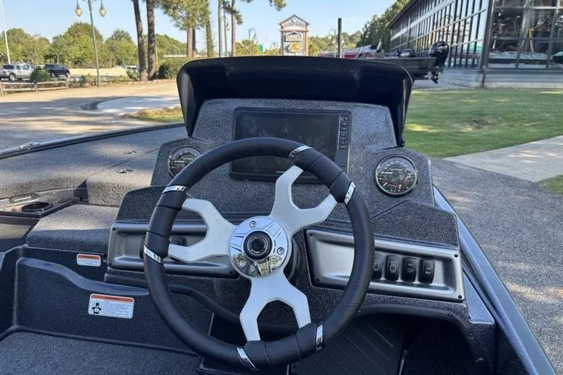 Slide: The Image of Steering console of a 2027 Nitro Z18 XL Pro boat, featuring modern controls and dashboard. - 18