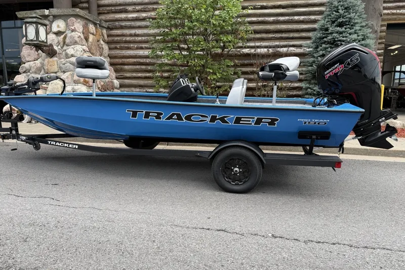 The Image of 2027 Tracker Pro Team 190 boat with Mercury Pro XS engine, parked outdoors. - 0