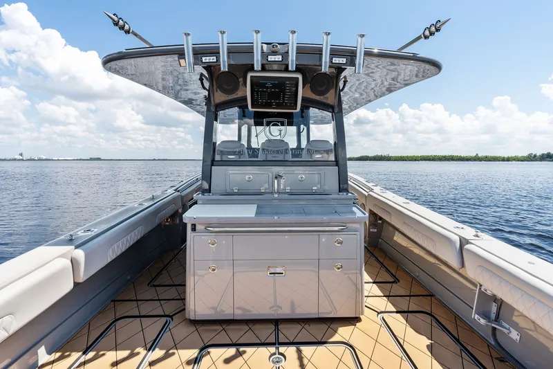 Slide: The Image of 2023 HCB 42 Lujo boat interior with sleek design and advanced navigation equipment. - 32