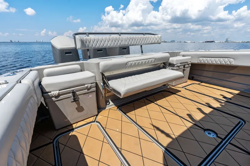 Slide: The Image of 2023 HCB 42 Lujo boat interior with luxurious seating and ocean view. - 28
