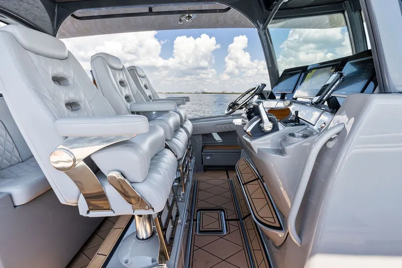 Slide: The Image of Luxurious interior of 2023 HCB 42 Lujo boat with plush seating and advanced controls. - 44