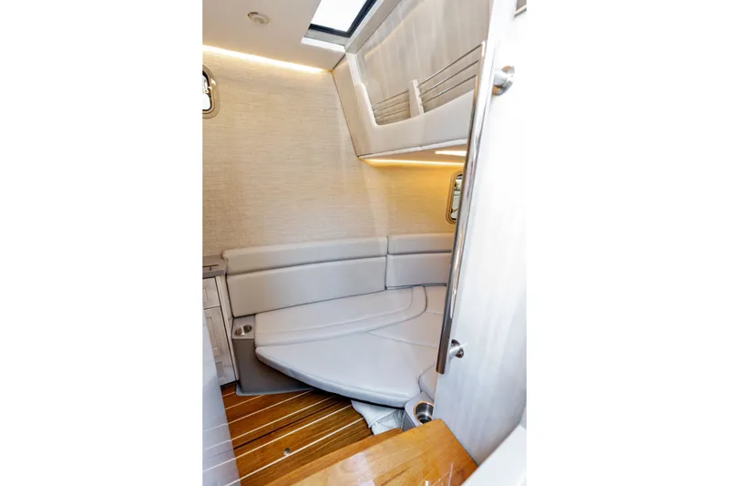Slide: The Image of 2023 HCB 42 Lujo cabin interior with sleek seating and modern design. - 60