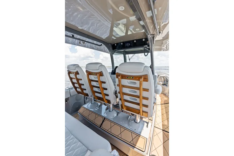 Slide: The Image of 2023 HCB 42 Lujo boat interior with luxurious seating and modern design. - 42