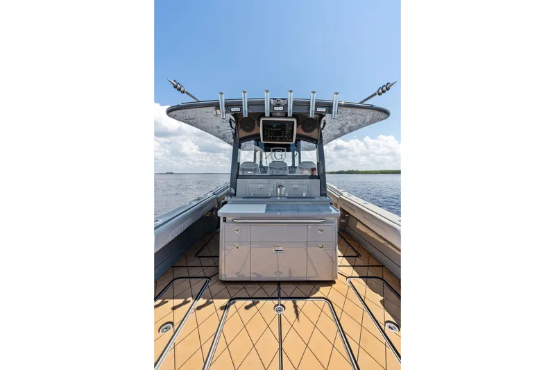 Slide: The Image of 2023 HCB 42 Lujo boat interior with sleek design and modern amenities on open water. - 33