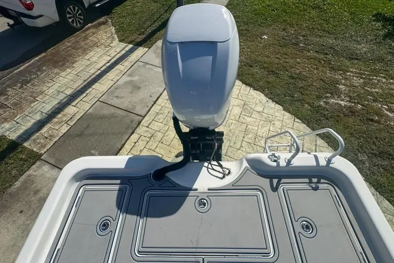 Slide: The Image of 2018 Blue Wave 2400 PureBay boat with outboard motor, viewed from above. - 54
