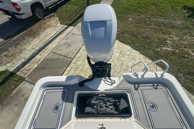 Slide: The Image of 2018 Blue Wave 2400 PureBay boat with outboard motor, viewed from above. - 55