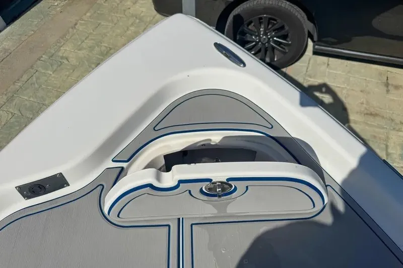 Slide: The Image of 2018 Blue Wave 2400 PureBay boat deck with sleek design and modern features. - 29