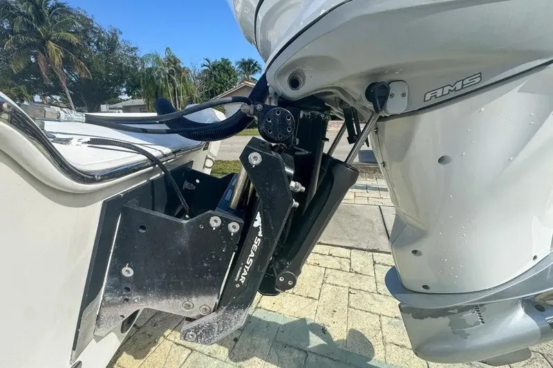 Slide: The Image of 2018 Blue Wave 2400 PureBay boat engine detail with SeaStar hydraulic steering system. - 71