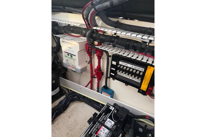 Slide: The Image of Electrical system of a 2012 Sea Ray 335 Sundancer boat, featuring wiring and circuit components. - 17