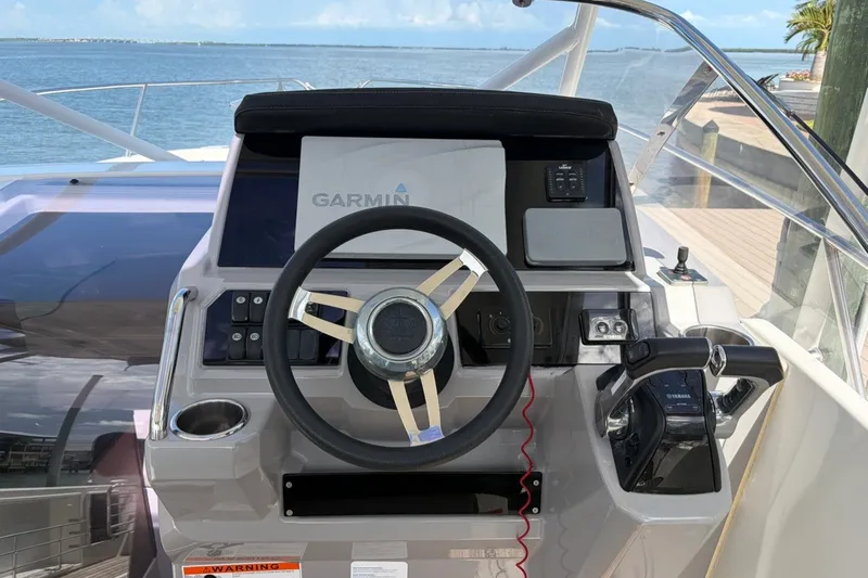 Slide: The Image of Helm of 2019 Jeanneau Leader 9.0 WA with Garmin navigation system. - 8