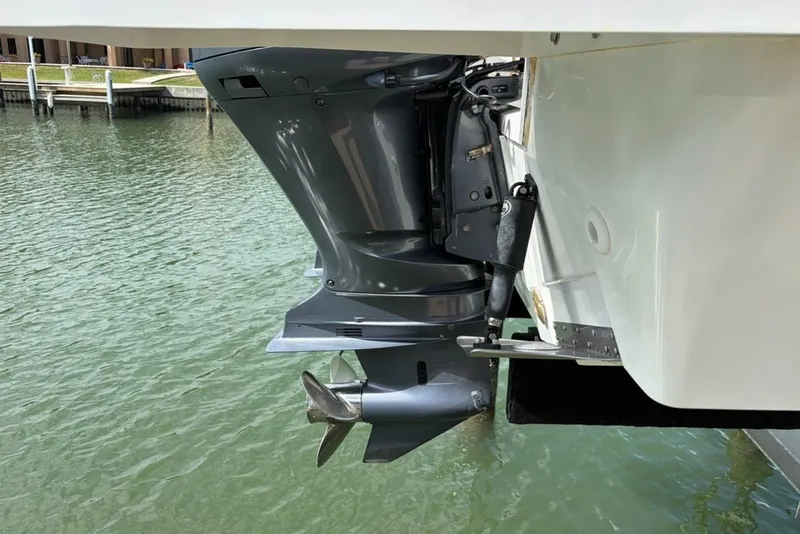 Slide: The Image of Outboard motor of 2019 Jeanneau Leader 9.0 WA boat on water. - 3