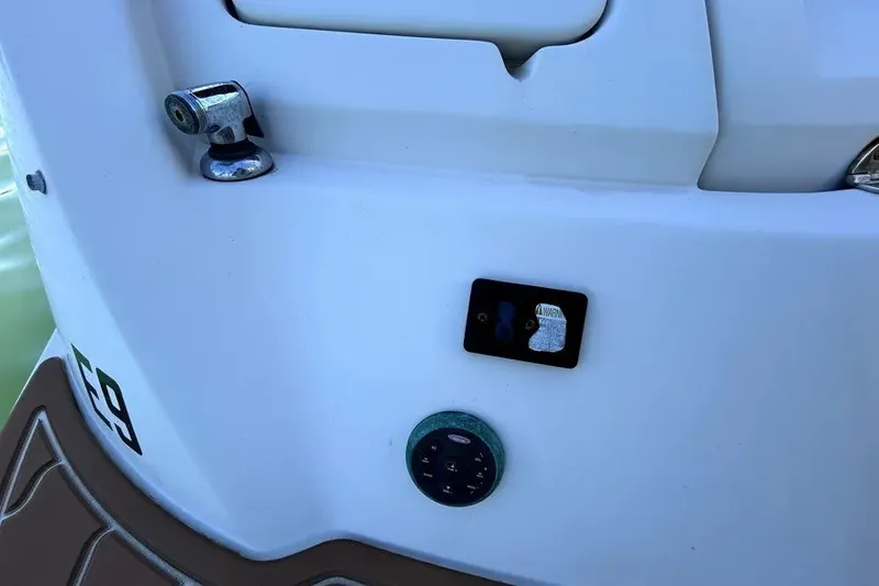 Slide: The Image of 2007 Sea Ray 260 Sundeck boat detail with cleat and control panel. - 32