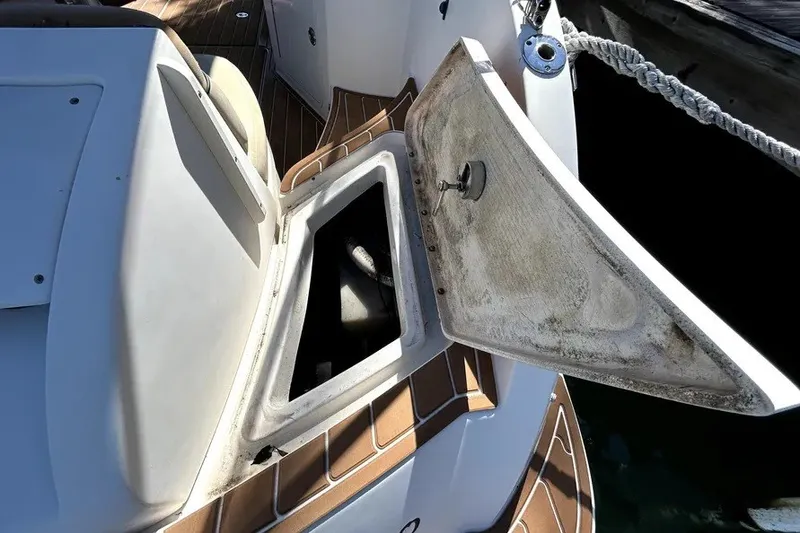 Slide: The Image of Open storage compartment on 2007 Sea Ray 260 Sundeck boat deck. - 38