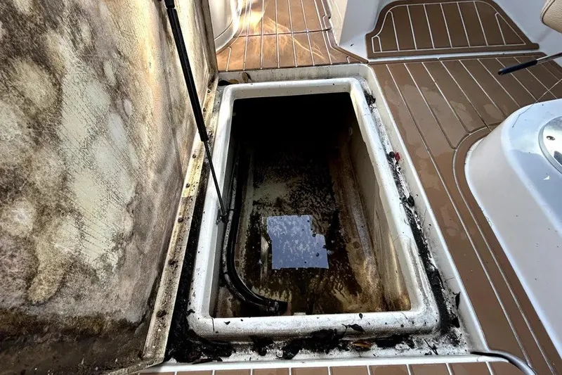 Slide: The Image of Open storage compartment on 2007 Sea Ray 260 Sundeck boat deck. - 47