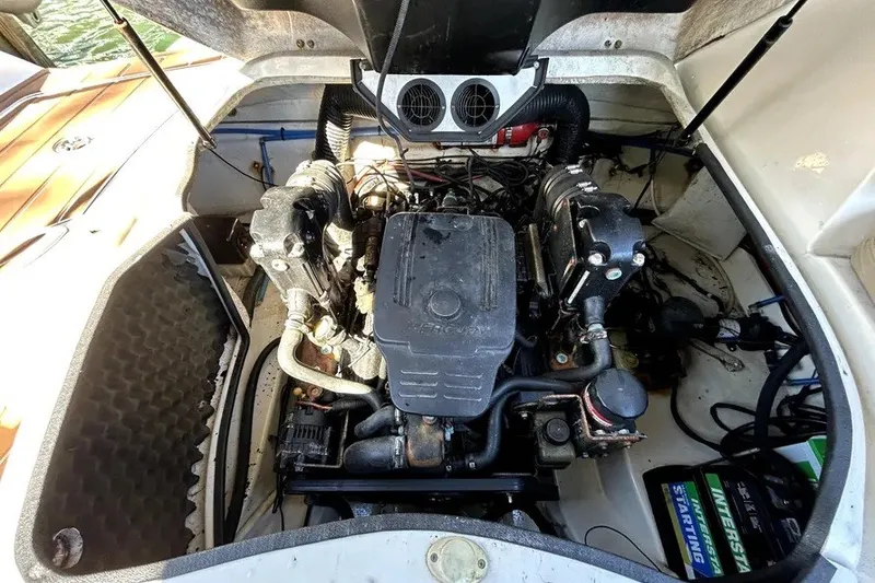 Slide: The Image of Engine compartment of a 2007 Sea Ray 260 Sundeck boat, showcasing the engine and components. - 41