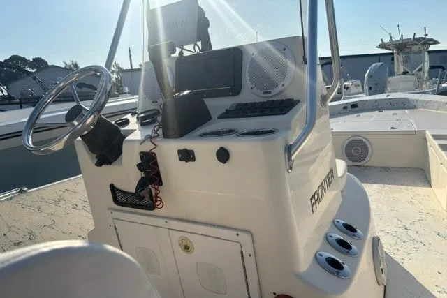 Slide: The Image of 2016 K2 Marine 2104 Frontier boat console with steering wheel and electronics. - 9