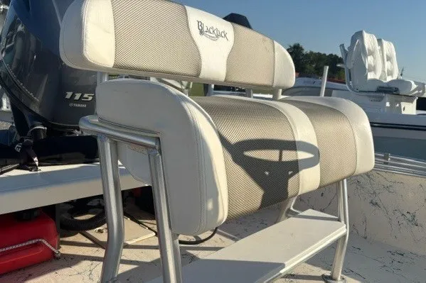 Slide: The Image of 2016 K2 Marine 2104 Frontier boat with cushioned seating and Yamaha 115 engine. - 3
