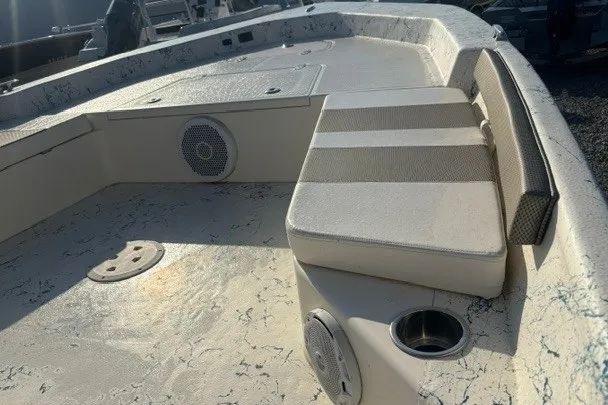 Slide: The Image of 2016 K2 Marine 2104 Frontier boat interior with seating and speakers. - 2