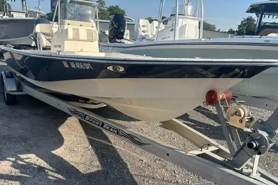 The Image of 2016 K2 Marine 2104 Frontier boat on trailer, parked outdoors. - 1