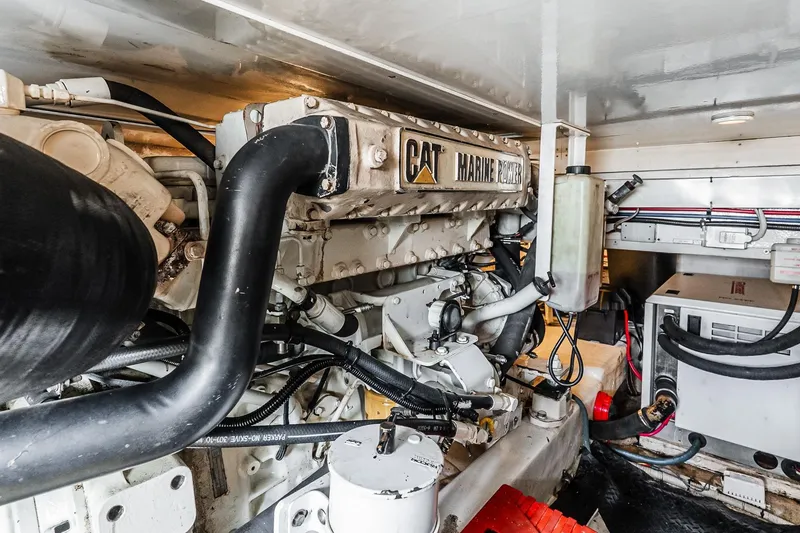 Slide: The Image of Engine room of 2003 Egg Harbor 42 Convertible with CAT marine engine. - 40