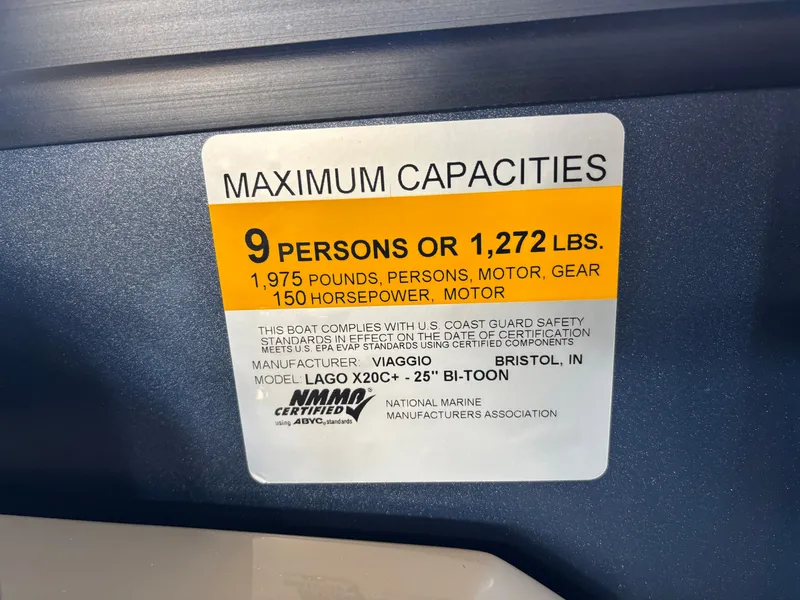 Slide: The Image of A sign shows the boat's maximum capacity: 9 persons or 1,272 pounds. - 13