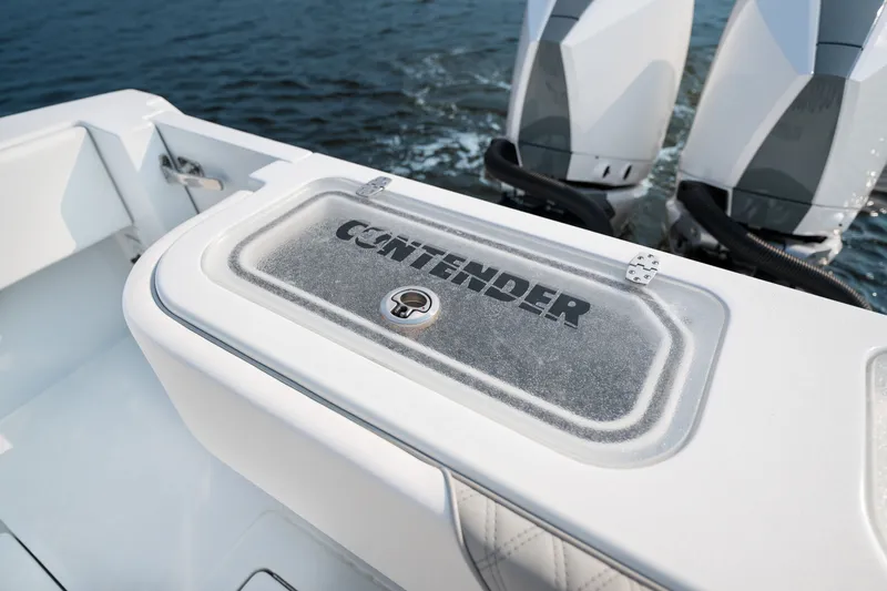 Slide: The Image of 2025 Contender 32 ST boat with dual engines on the water. - 34