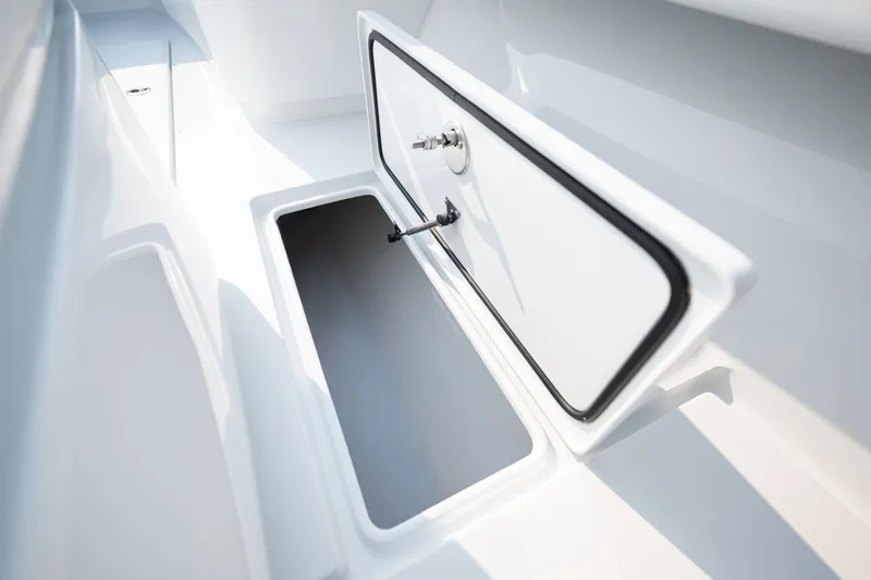 Slide: The Image of Open storage compartment on 2025 Contender 32 ST boat, showcasing sleek design and functionality. - 21