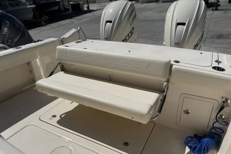 Slide: The Image of 2026 Grady-White Canyon 336 boat with foldable seating and twin Yamaha outboard engines. - 34