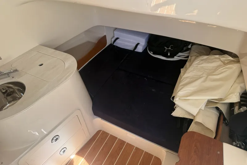 Slide: The Image of Interior cabin of 2026 Grady-White Canyon 336 boat with sink and storage. - 24