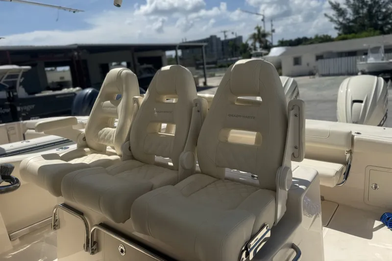 Slide: The Image of Luxury seating on 2026 Grady-White Canyon 336 boat, featuring plush, ergonomic design. - 17