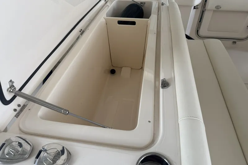 Slide: The Image of Open storage compartment on 2026 Grady-White Canyon 336 boat, featuring sleek design and functionality. - 30