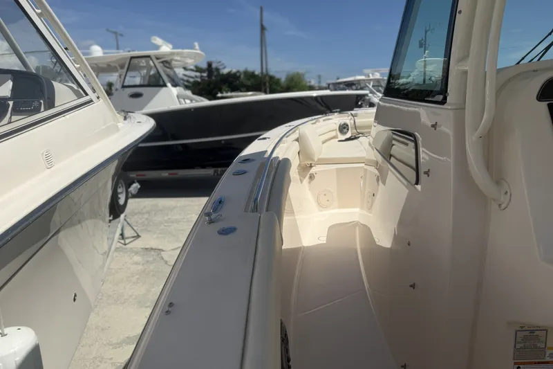 Slide: The Image of 2026 Grady-White Canyon 336 boat interior, showcasing sleek design and spacious layout. - 19