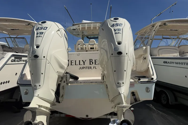 Slide: The Image of 2026 Grady-White Canyon 336 boat with twin 450 V8 engines, docked in Jupiter, FL. - 35