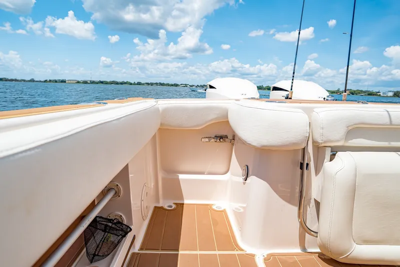 Slide: The Image of 2015 Grady-White Canyon 306 boat interior with ocean view and clear sky. - 30