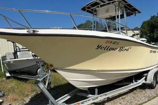 Slide: The Image of 2005 Key West 225 Center Console boat named "Yellow Bird" on a trailer. - 3