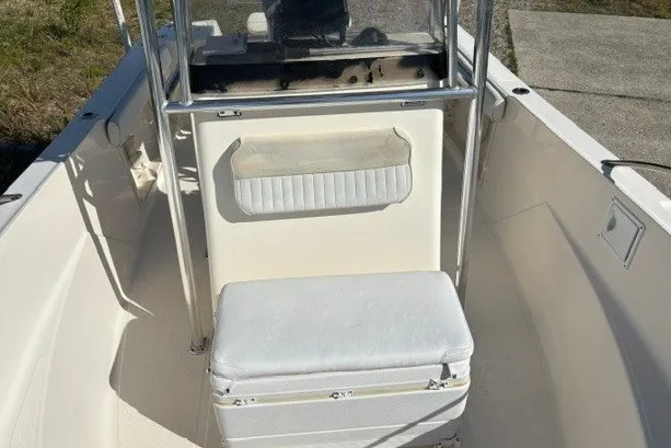 Slide: The Image of 2005 Key West 225 Center Console boat interior with seating and console view. - 8