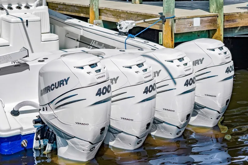 Slide: The Image of 2013 Yellowfin 39 Offshore boat with four Mercury 400 Verado outboard engines docked. - 37