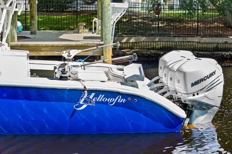 Slide: The Image of 2013 Yellowfin 39 Offshore boat with Mercury engines docked in a marina. - 45