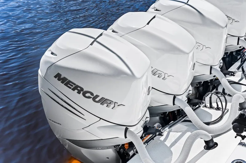 Slide: The Image of Triple Mercury outboard engines on a 2013 Yellowfin 39 Offshore boat. - 39
