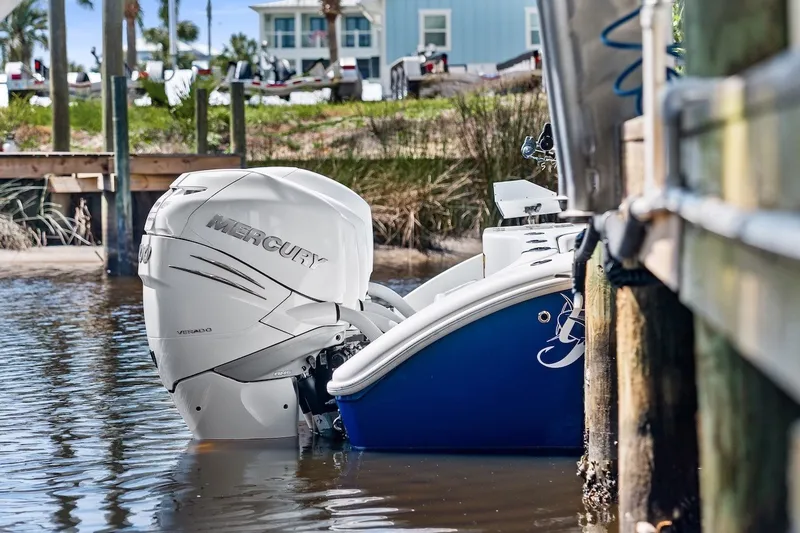 Slide: The Image of 2013 Yellowfin 39 Offshore boat with Mercury outboard engine docked in marina. - 44
