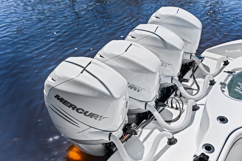 Slide: The Image of 2013 Yellowfin 39 Offshore boat with four Mercury outboard engines on water. - 38