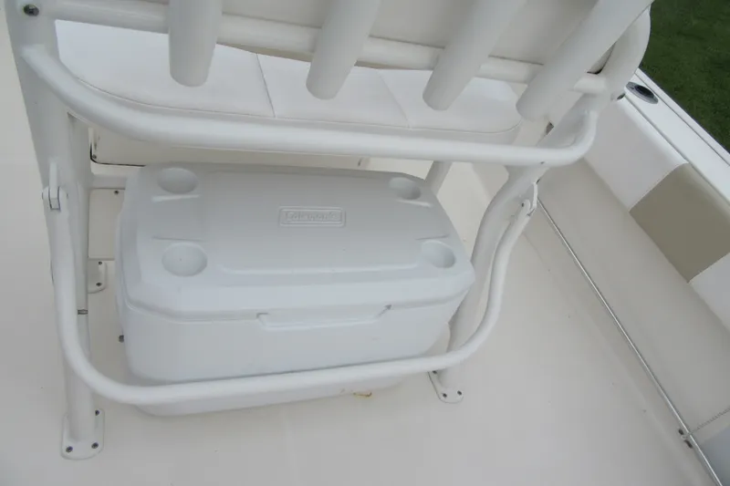 Slide: The Image of 2018 Robalo R180 Center Console boat with integrated cooler storage. - 21