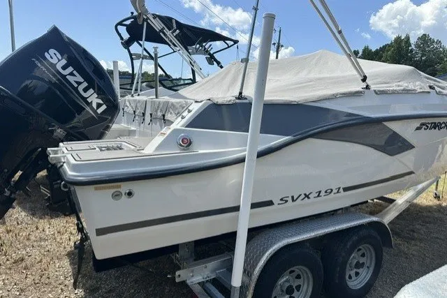 Slide: The Image of 2022 Starcraft SVX 191 OB boat on trailer with Suzuki outboard motor. - 30