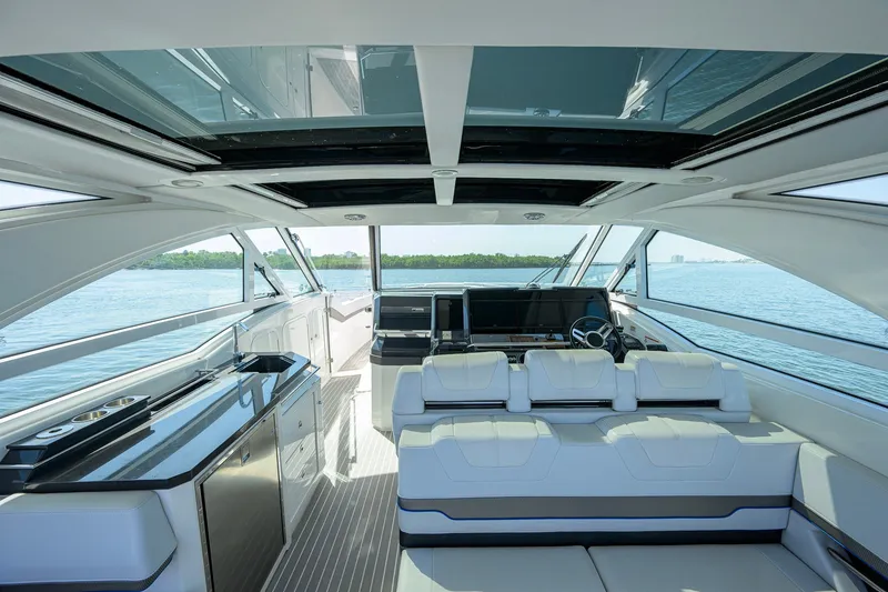 Slide: The Image of Luxurious interior of 2019 Formula 430 Super Sport Crossover yacht with panoramic windows. - 32