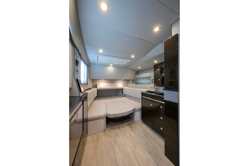 Slide: The Image of Interior of 2019 Formula 430 Super Sport Crossover yacht, featuring modern design and luxurious seating. - 85