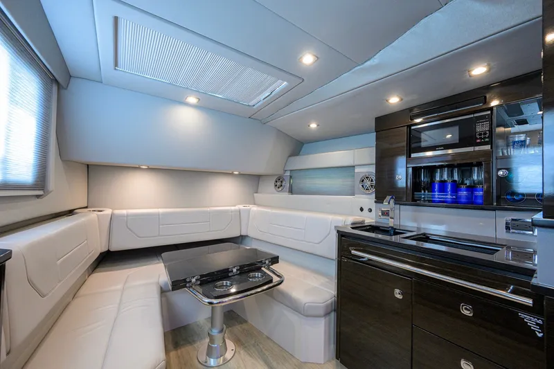 Slide: The Image of Luxurious interior of 2019 Formula 430 Super Sport Crossover yacht with modern kitchen and seating. - 83