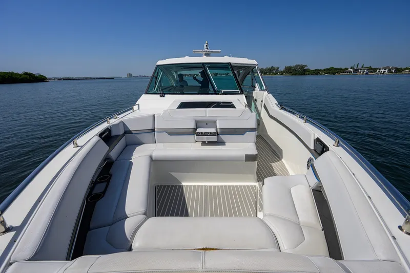 Slide: The Image of 2019 Formula 430 Super Sport Crossover boat interior on calm water. - 47