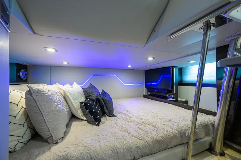 Slide: The Image of Luxurious interior of 2019 Formula 430 Super Sport Crossover with modern lighting and cozy bedding. - 89