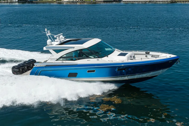Slide: The Image of 2019 Formula 430 Super Sport Crossover cruising on blue water. - 67