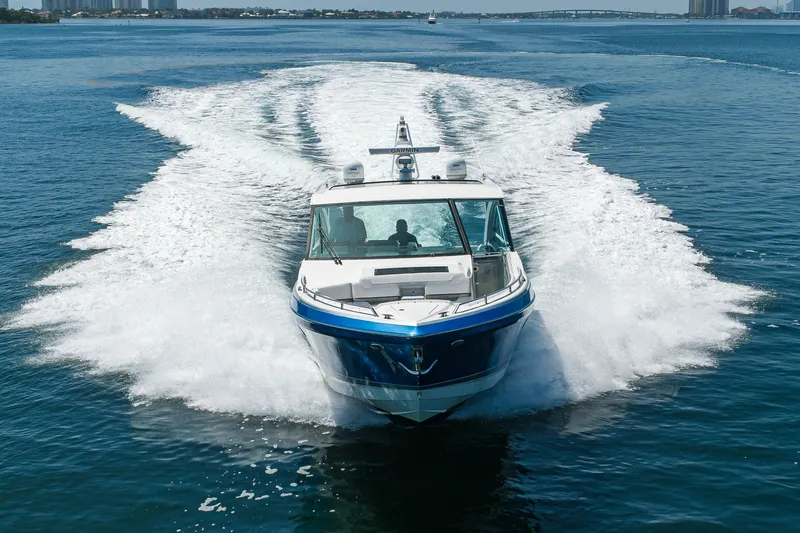 Slide: The Image of 2019 Formula 430 Super Sport Crossover cruising on open water, leaving a wake behind. - 71